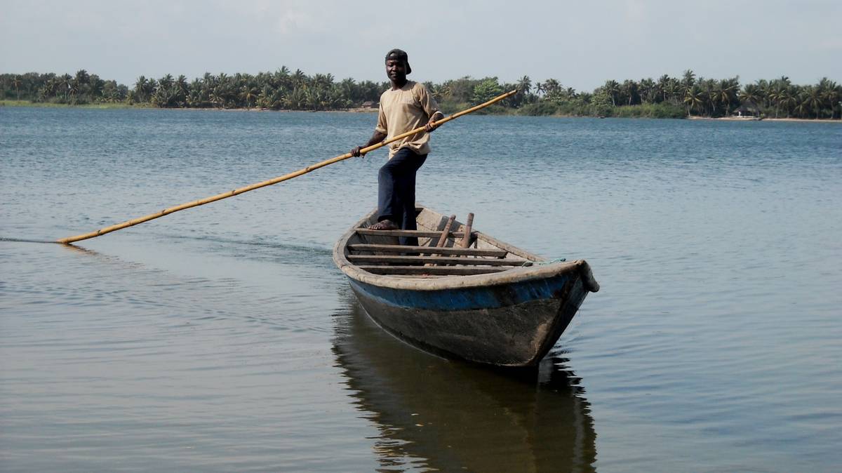 Man in canoe on the Volta River