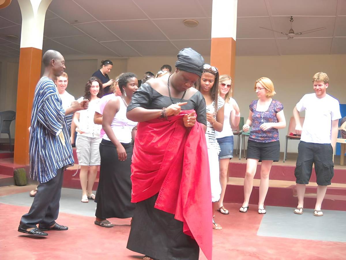 Student group having traditional blessing at the chief
